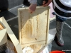 Here I am cleaning the bottom board with my hive tool.