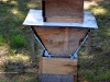 Top bar hive nuc with a Warre nuc on top.